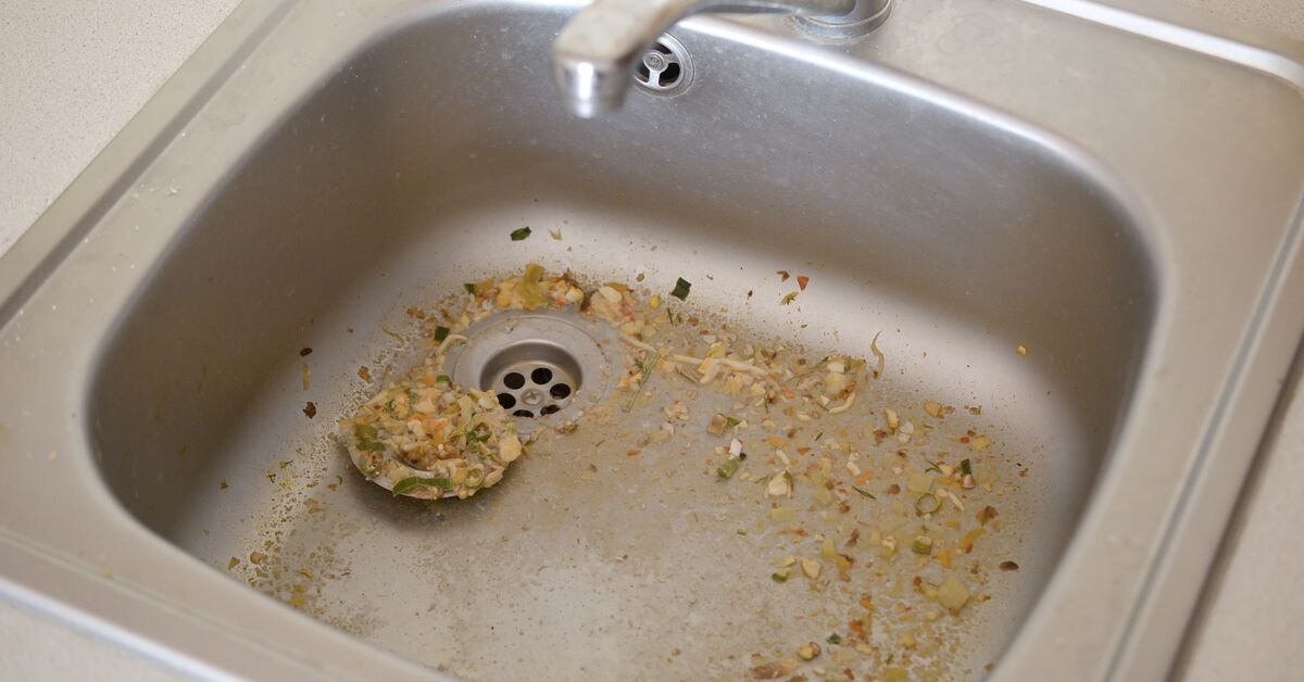 Greasy sink drain with visible buildup