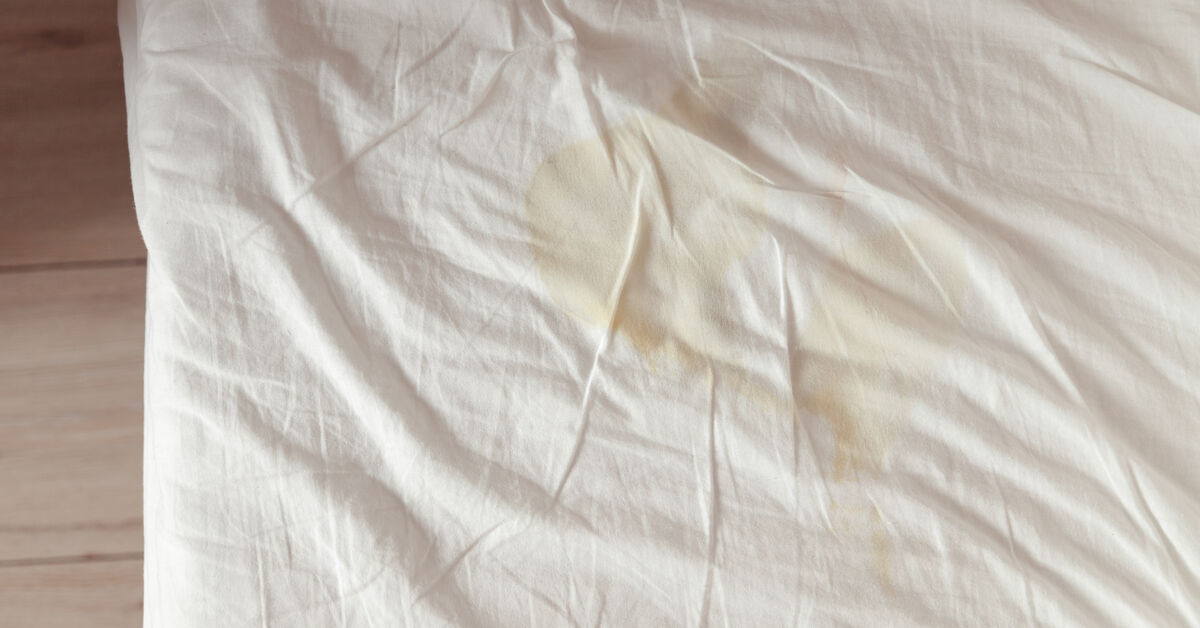 Stained sleeping surface with visible discoloration